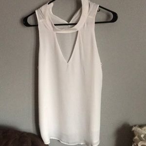 Sleeveless off white blouse